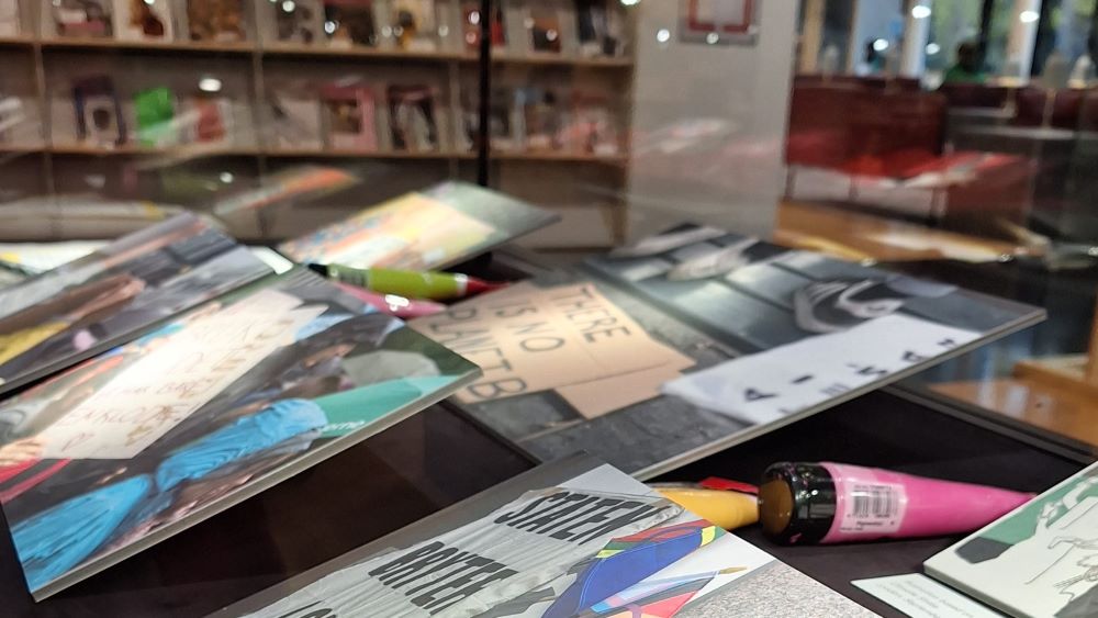 Image may contain: Photograph, Product, Shelf, Publication, Shelving.